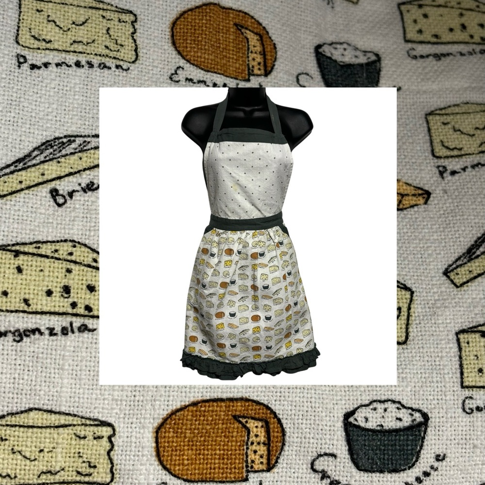 Bibbed apron ties at neck & waist AOP cheese.